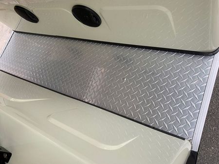 Diamond plate floor with speaker